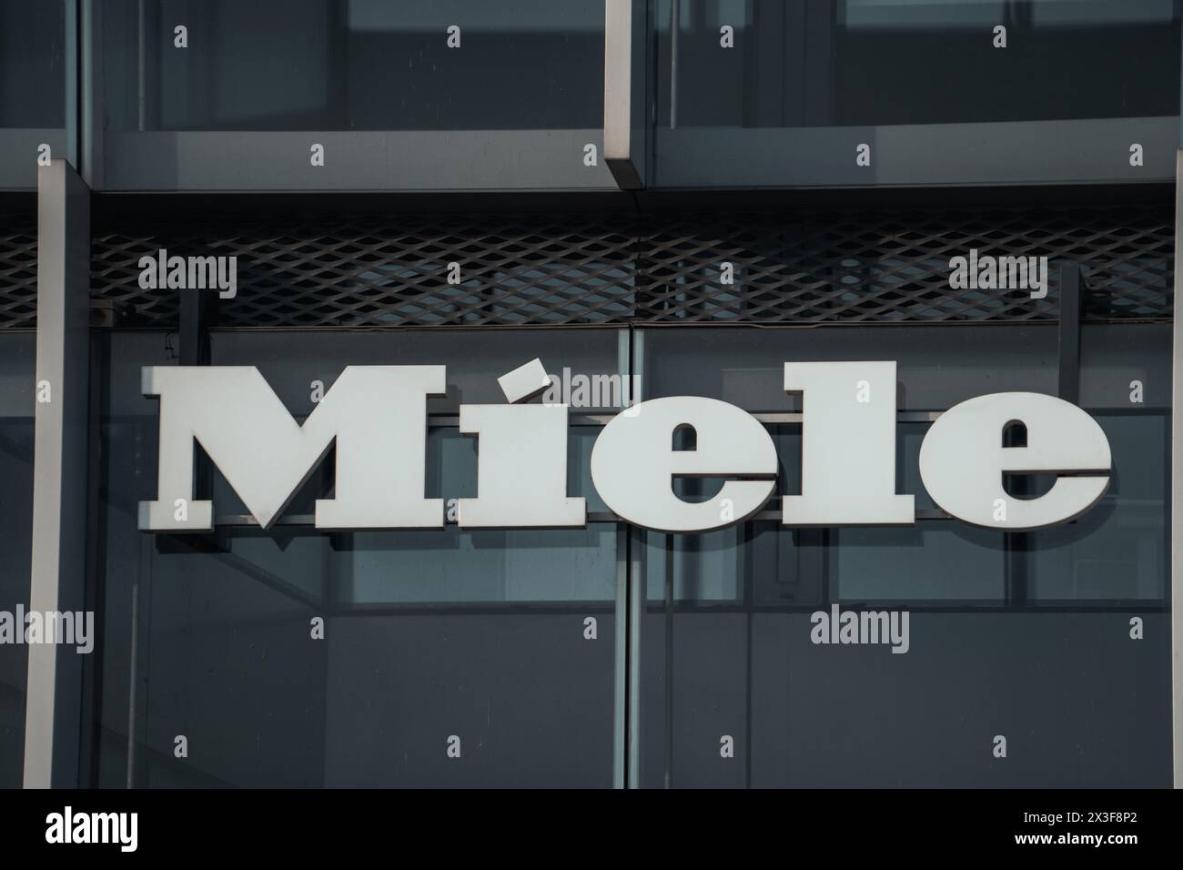 Vilnius, Lithuania - November 9, 2023: Miele logo on modern office building. Miele is German manufacturer of high-end domestic appliances and Stock Photo