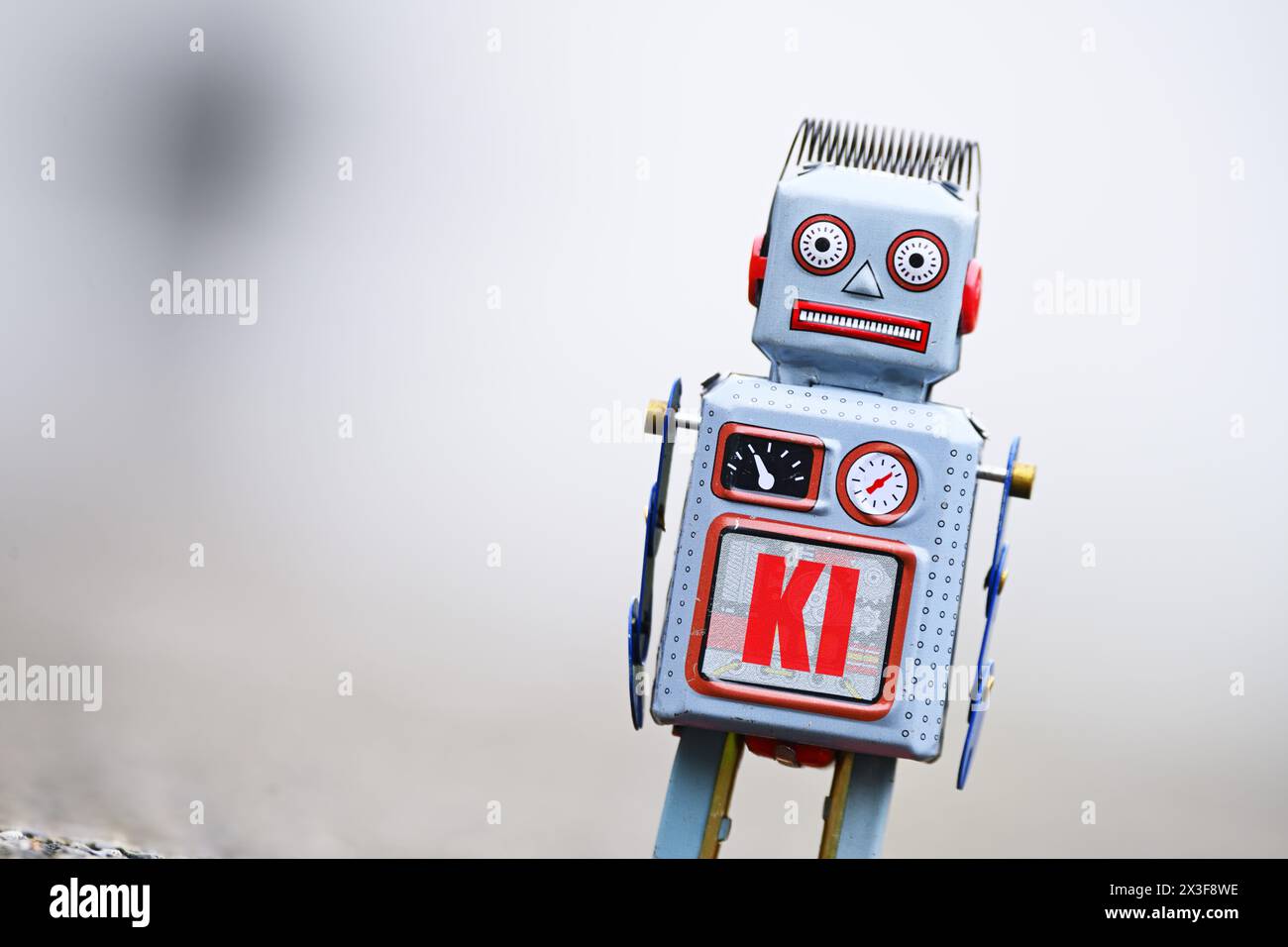 Robot Figure With AI Label, Photomontage Stock Photo