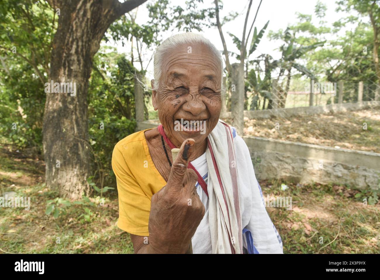 Morigaon, Assam, India. 26th Apr, 2024. A old woman shows her finger marked with indelible ink after casting vote for the second phase of voting of India's general election in Morigaon, Assam, India. (Credit Image: © Hafiz Ahmed/ZUMA Press Wire) EDITORIAL USAGE ONLY! Not for Commercial USAGE! Credit: ZUMA Press, Inc./Alamy Live News Stock Photo