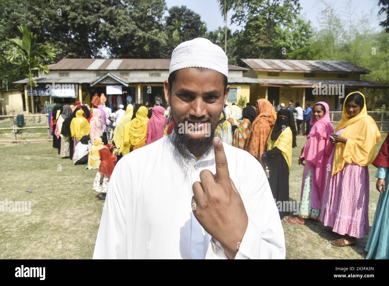 Morigaon, Assam, India. 26th Apr, 2024. A Muslim Man shows his ink-marked finger after casting his vote at polling station during the second phase of voting of India's general election in Morigaon, Assam, India. (Credit Image: © Hafiz Ahmed/ZUMA Press Wire) EDITORIAL USAGE ONLY! Not for Commercial USAGE! Credit: ZUMA Press, Inc./Alamy Live News Stock Photo