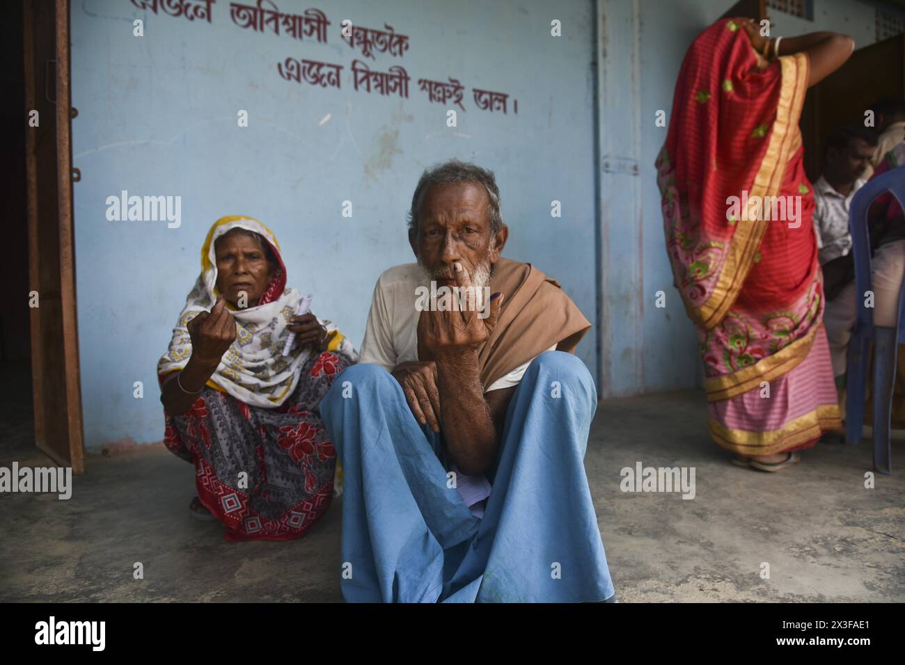 Morigaon, Assam, India. 26th Apr, 2024. A elder couple shows their ink-marked finger after casting their vote at polling station during the second phase of voting of India's general election in Morigaon, Assam, India. (Credit Image: © Hafiz Ahmed/ZUMA Press Wire) EDITORIAL USAGE ONLY! Not for Commercial USAGE! Credit: ZUMA Press, Inc./Alamy Live News Stock Photo