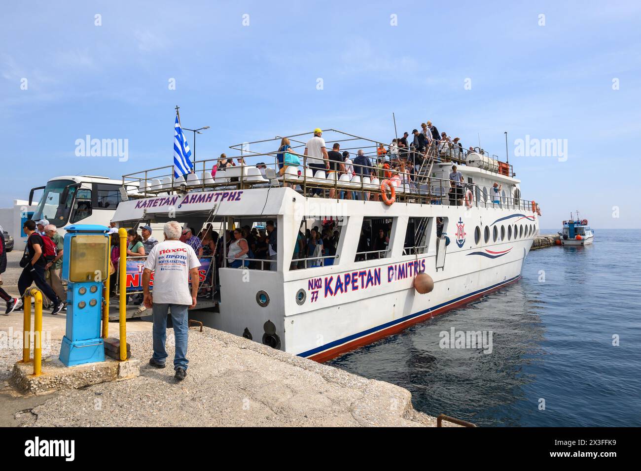 Nisyros, Greece - May 10, 2023: Excursion boat moored in port of Mandrakia on the island of Nisyros. Dodecanese, Greece Stock Photo