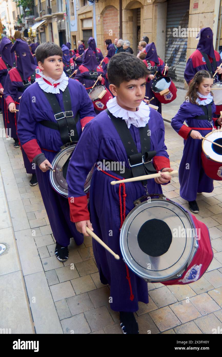 Tarragona, Spain - April 26, 2024: Captured moment of a religious procession, highlighting the intensity of the event. Stock Photo