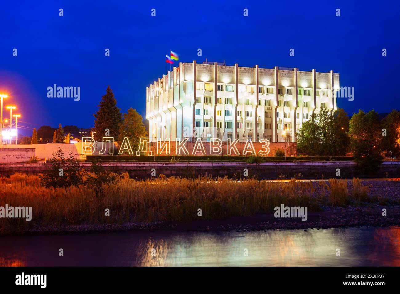 Vladikavkaz, Russia - September 25, 2020: City administration building at the Terek river embankment in Vladikavkaz city, North Ossetia Alania, Russia Stock Photo