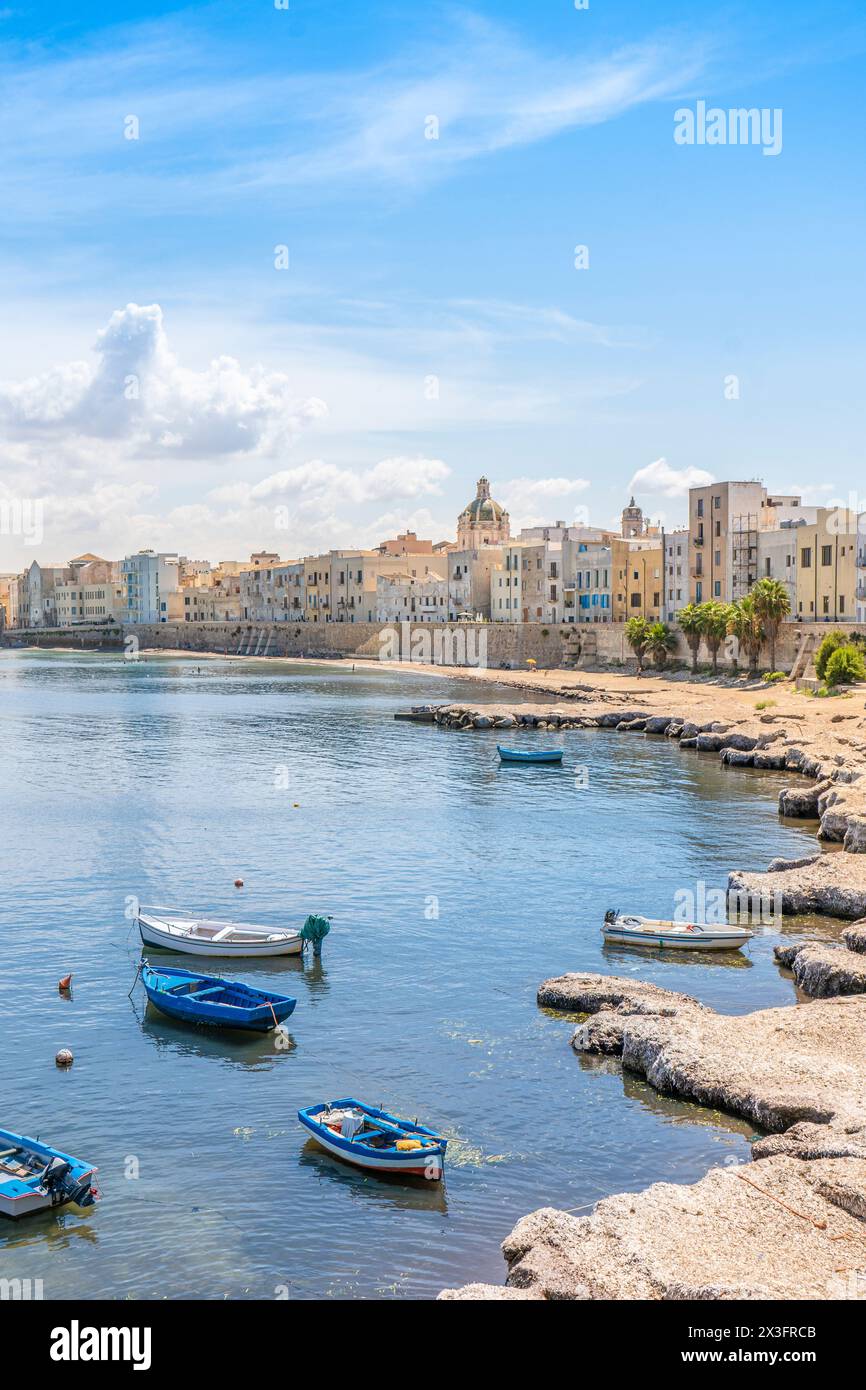 View of old town Trapani coastline: simple fishermen houses facing the ...