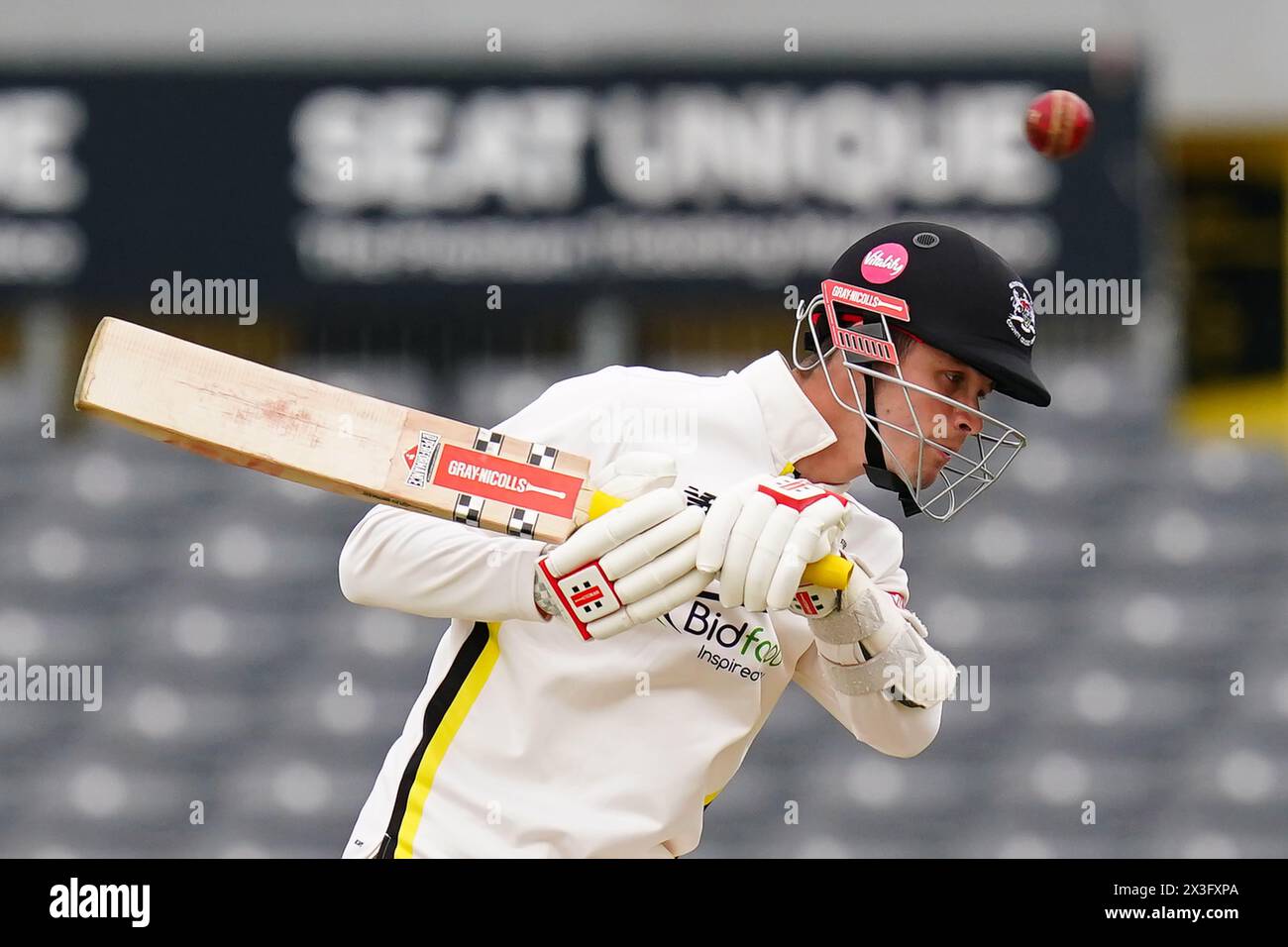 Bristol, UK, 26 April 2024. Gloucestershire's Ollie Price ducks under a short ball during the Vitality County Championship Division Two match between Gloucestershire and Middlesex. Credit: Robbie Stephenson/Gloucestershire Cricket/Alamy Live News Stock Photo