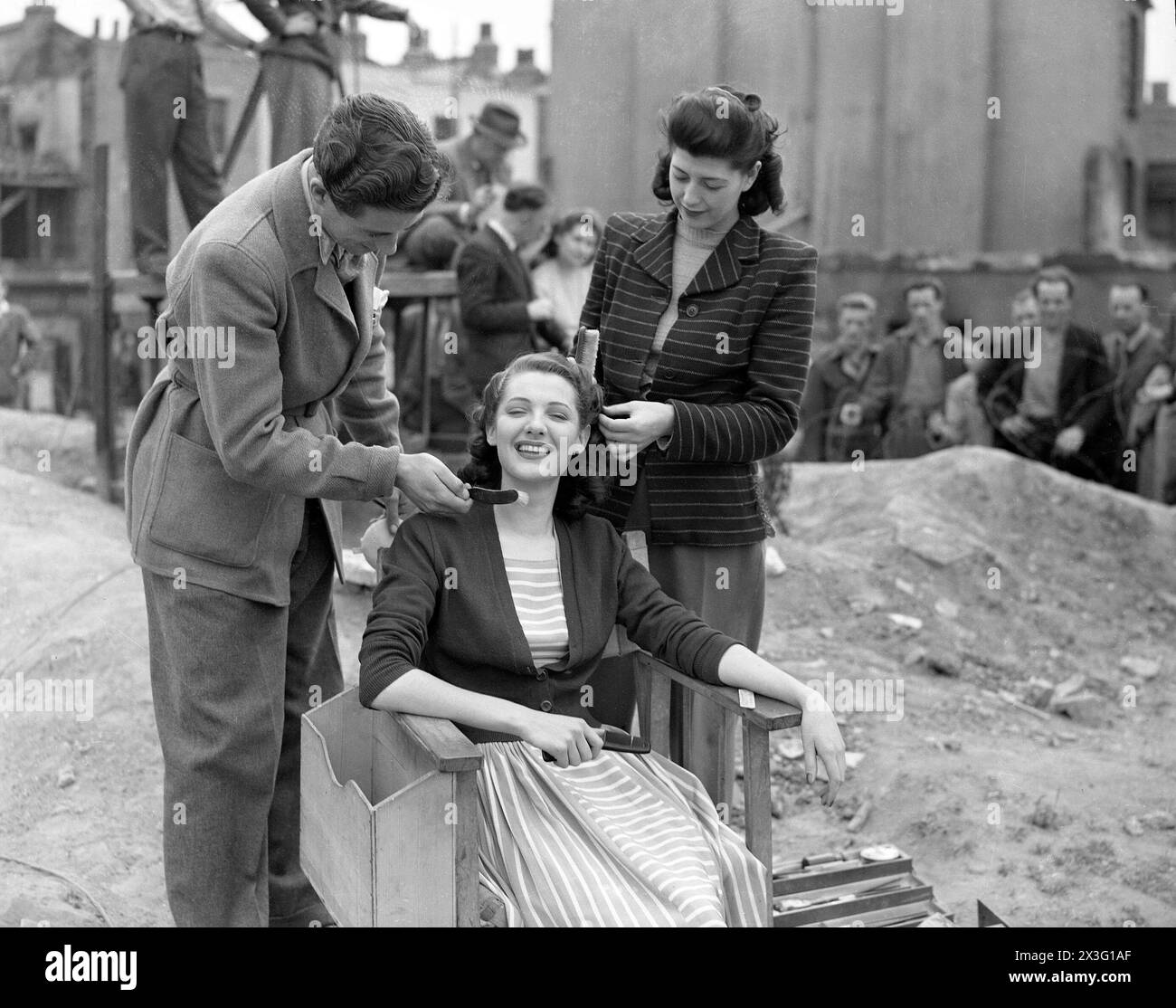 British Actress BARBARA MURRAY having her hair and make-up done before filming a scene for the EALING  comedy PASSPORT TO PIMLICO 1949 filmed on location in a large bombsite in Lambeth Director HENRY CORNELIUS Screenplay T.E.B. CLARKE Music GEORGES AURIC Ealing Studios Stock Photo