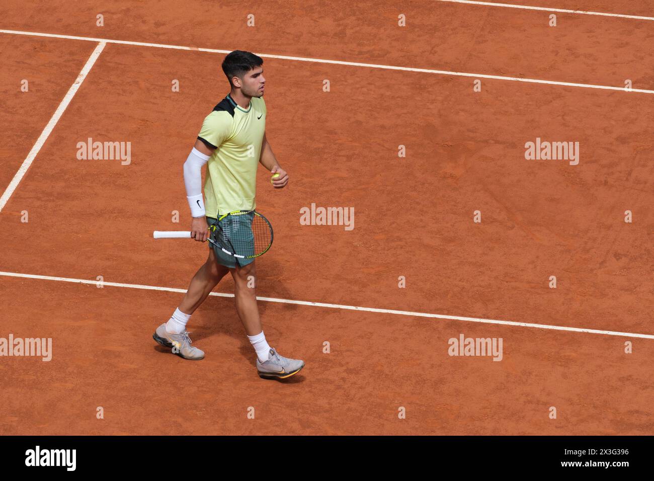 Carlos Alcaraz of Spain  against Alexander Shevchenko  during their second round match on day four of the Mutua Madrid Open at La Caja Magica on April Stock Photo