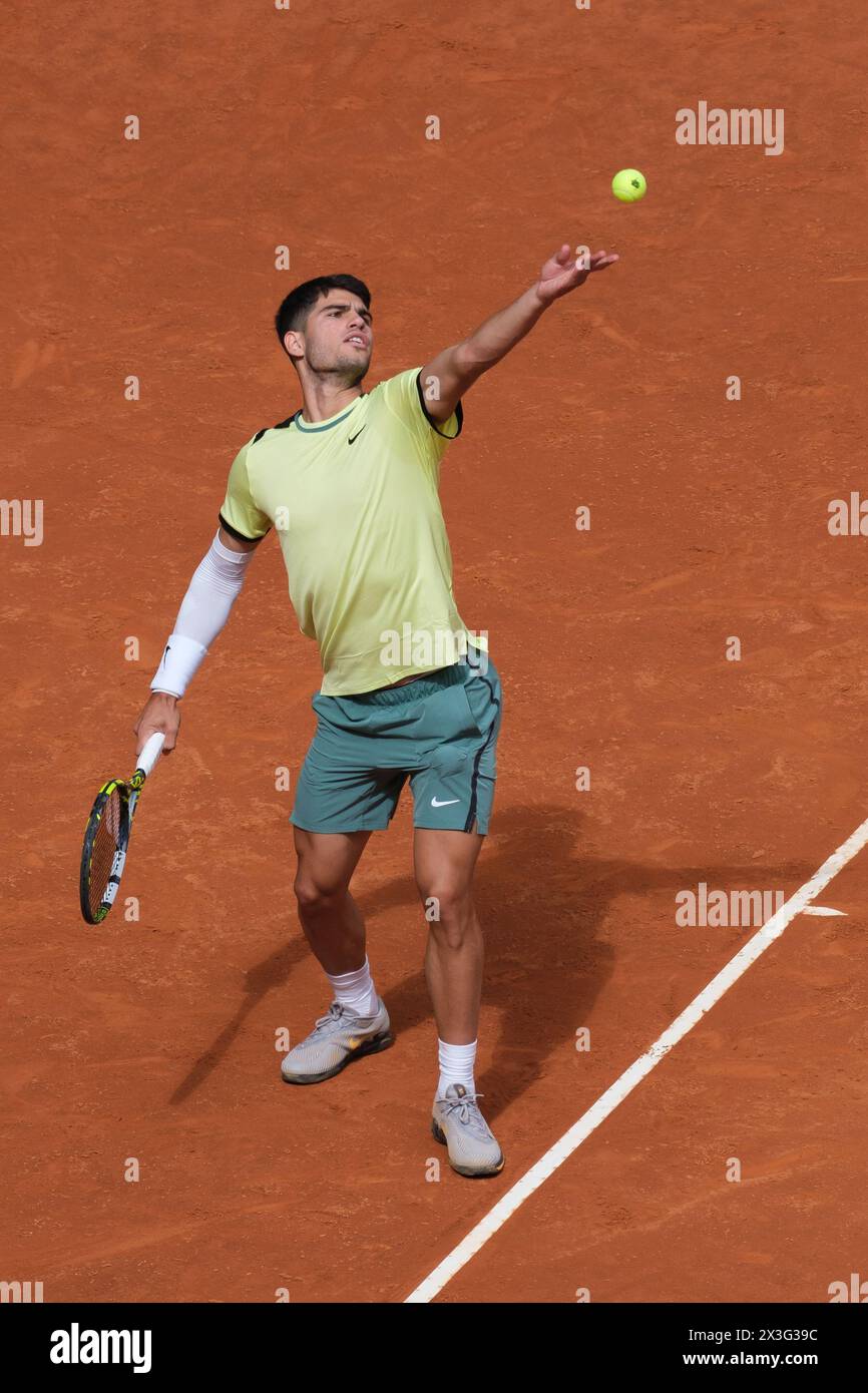 Carlos Alcaraz of Spain  against Alexander Shevchenko  during their second round match on day four of the Mutua Madrid Open at La Caja Magica on April Stock Photo