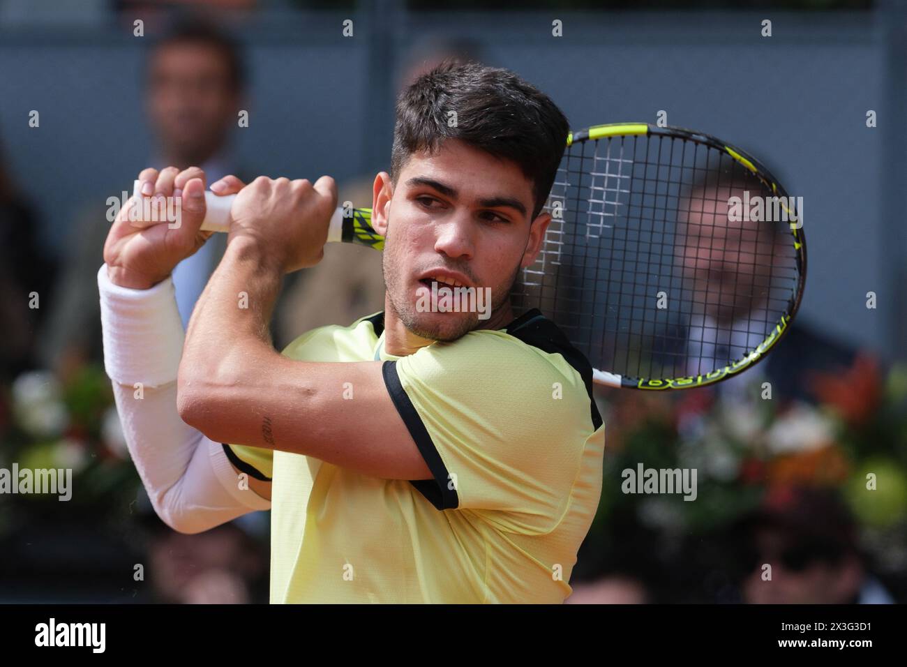 Carlos Alcaraz of Spain  against Alexander Shevchenko  during their second round match on day four of the Mutua Madrid Open at La Caja Magica on April Stock Photo