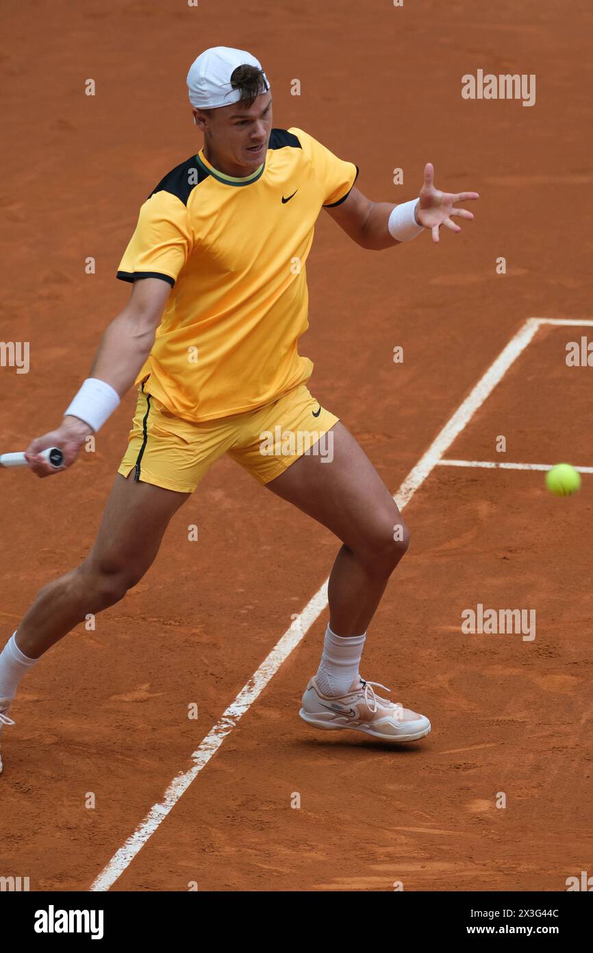 Holger Rune of Norway  against Mariano Navone  during their second round match on day four of the Mutua Madrid Open at La Caja Magica on April 26, 202 Stock Photo