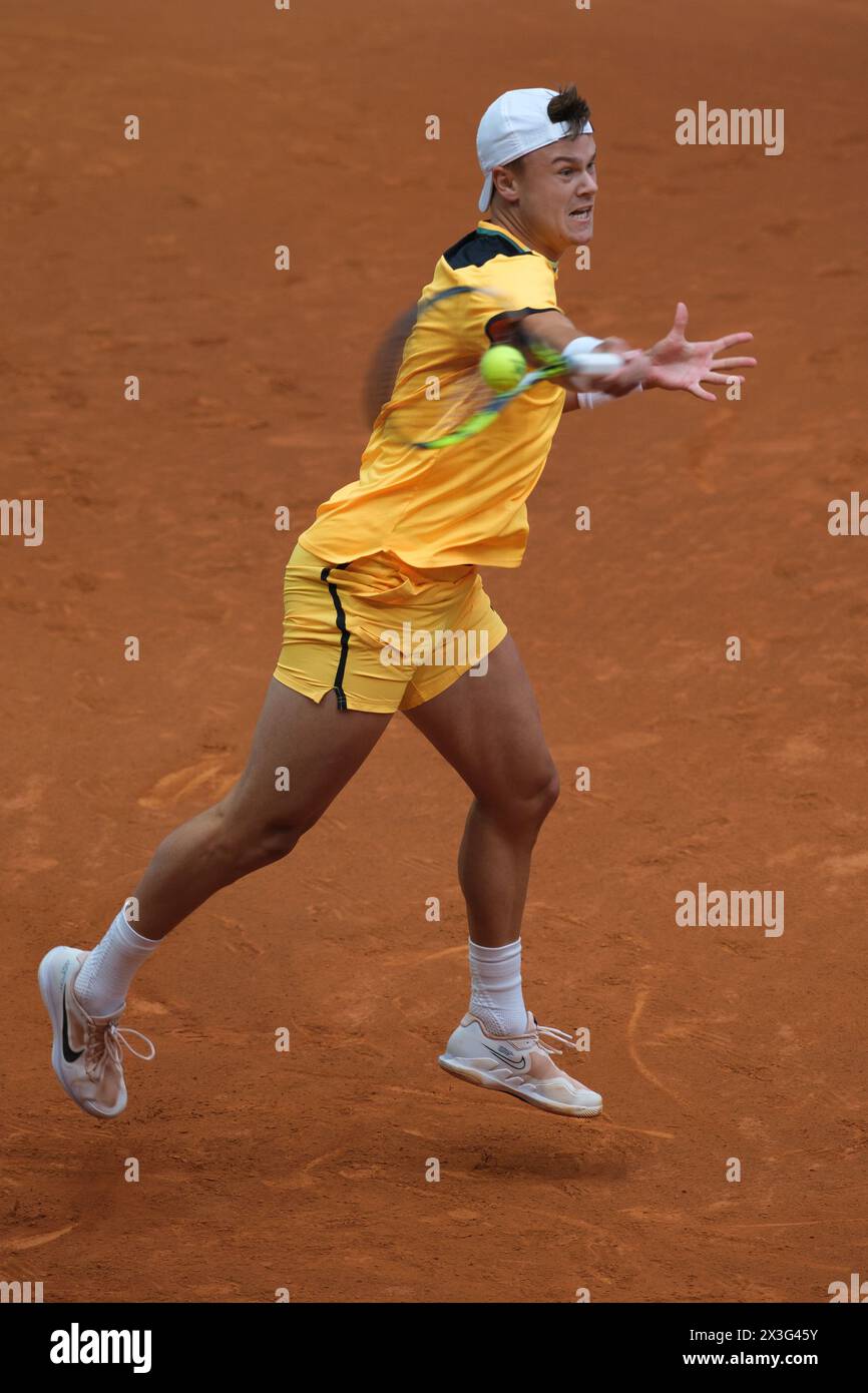 Holger Rune of Norway  against Mariano Navone  during their second round match on day four of the Mutua Madrid Open at La Caja Magica on April 26, 202 Stock Photo