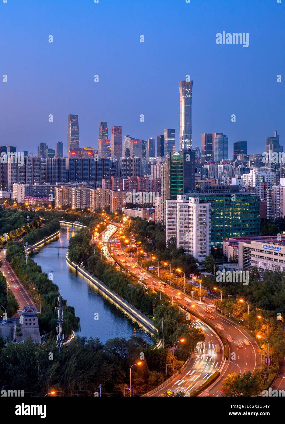 The night CBD of Guomao cityscape with traffic flow in Beijing, China Stock Photo