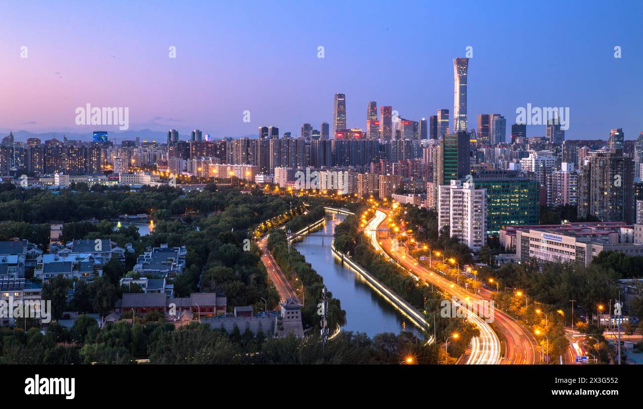 The night CBD of Guomao cityscape with traffic flow in Beijing, China Stock Photo