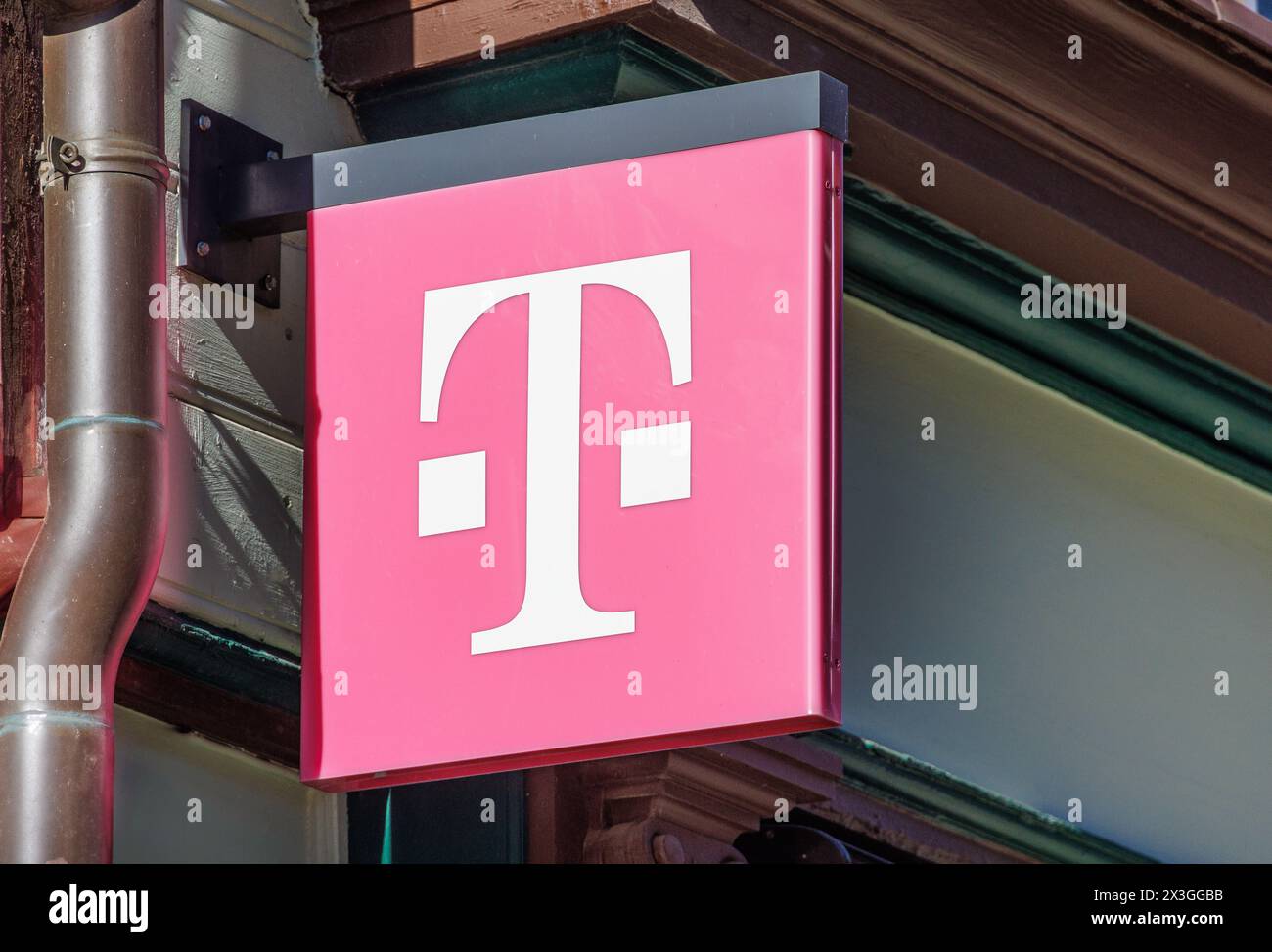 QUEDLINBURG, GERMANY - September 6, 2023:   Logo of Deutsche Telekom on a shop. There are around 750 so called 'T-Punkt' shops which sell products and Stock Photo