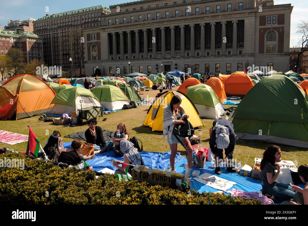 Protesters are seen at a pro-Palestine encampment at Columbia University. Pro-Palestine demonstrators rallied on the lawn in Columbia University in Manhattan, New York City condemning the Israel Defense Forces' military operations in Gaza. Since last week, students and pro-Palestine activists at Columbia University have held a sit-in protest on campus, forming a 'Gaza Solidarity Encampment.' Encampments have been forming in other universities in New York City, as well as in campuses nationwide in support of Palestine. Negotiations are underway between student protestors at Columbia University Stock Photo