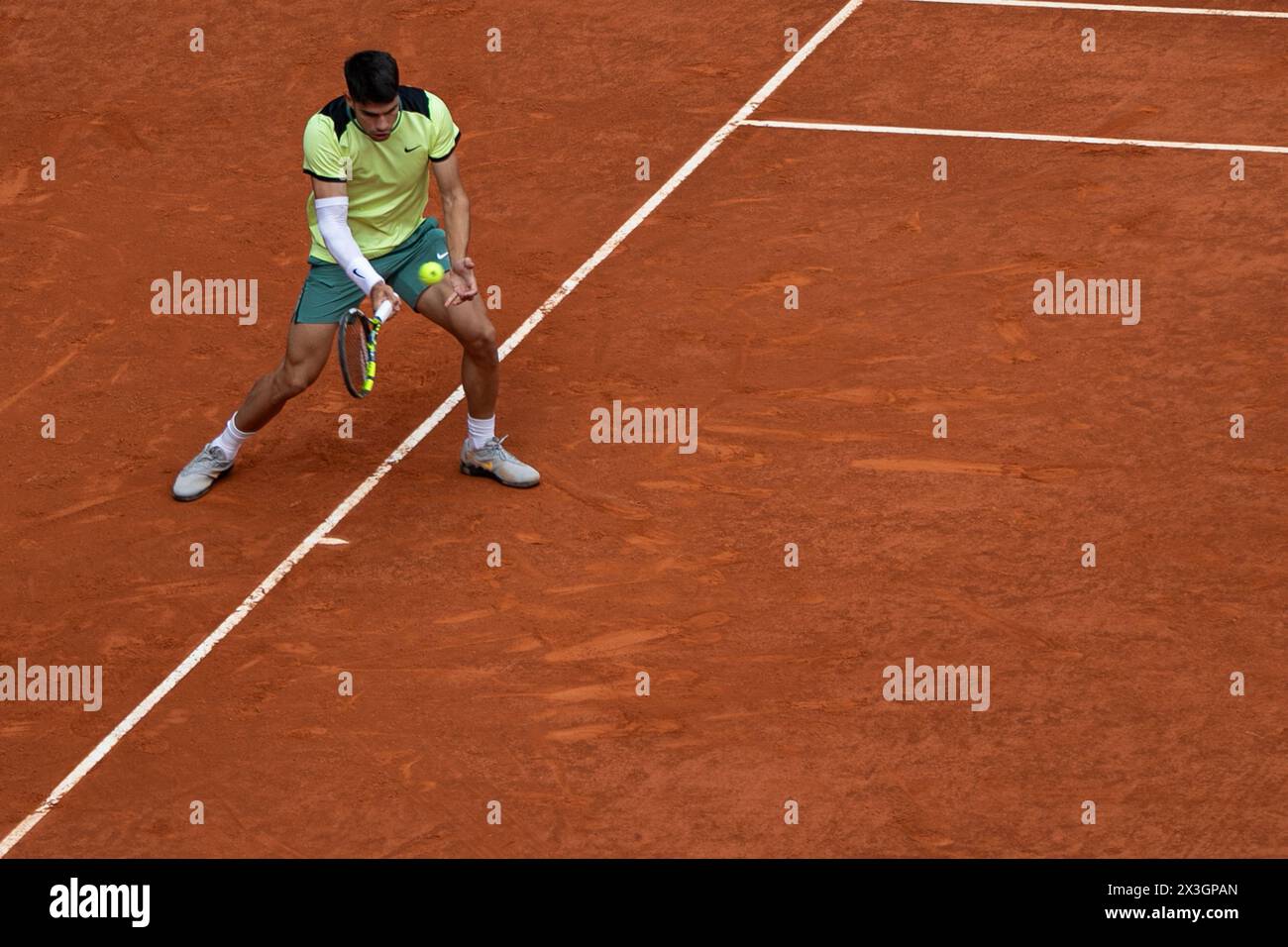 Madrid, Spain. 26th Apr, 2024. Carlos Alcaraz in a play during this afternoon's tennis match at the Caja Magica in Madrid. Carlos Alcaraz defeated Kazakh Alexander Shevchenko in two sets (2-6 and 1-6) at the Madrid Open tennis tournament. Credit: SOPA Images Limited/Alamy Live News Stock Photo