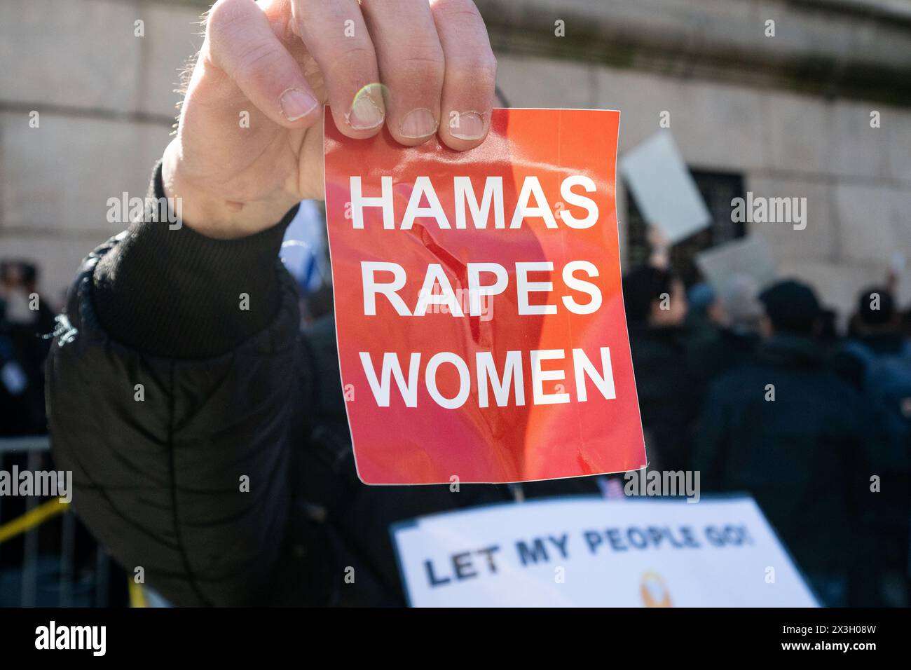 New York City, United States. 26th Apr, 2024. Man holding a small sign saying 'Hamas Rapes Women' at a rally to free hostages held by Hamas in Gaza, while standing in front of Columbia University in New York City. Credit: SOPA Images Limited/Alamy Live News Stock Photo