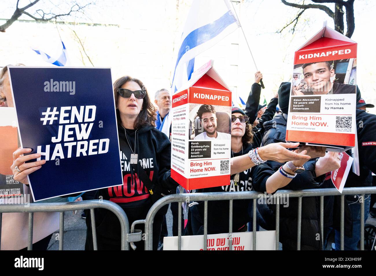 New York City, United States. 26th Apr, 2024. Women holding large milk containers with information about people kidnapped by Hamas, at a rally to free hostages held by Hamas in Gaza, while standing in front of Columbia University in New York City. Credit: SOPA Images Limited/Alamy Live News Stock Photo
