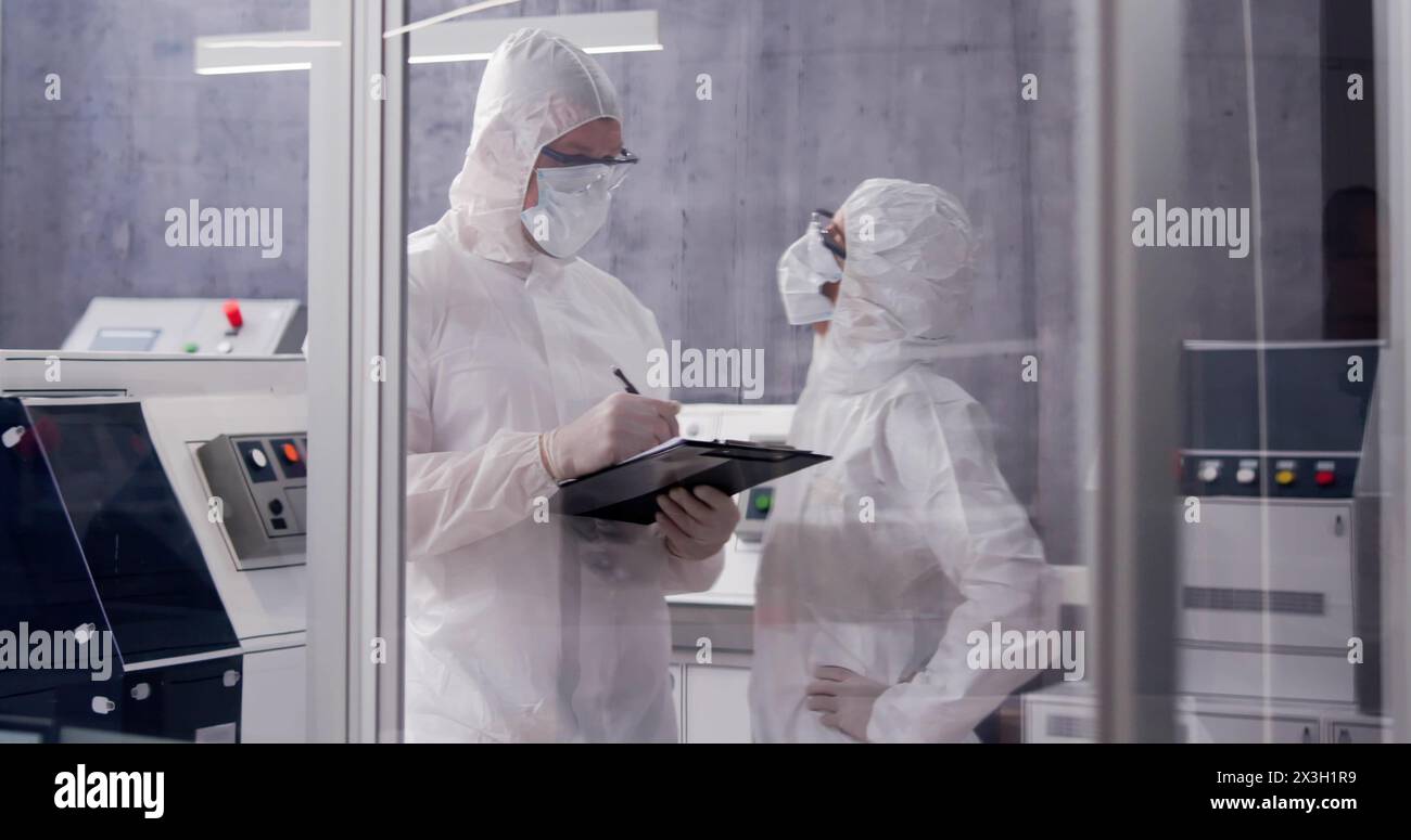 Clean Working Lab Clean room laboratory talking hi-res stock photography and images - Alamy