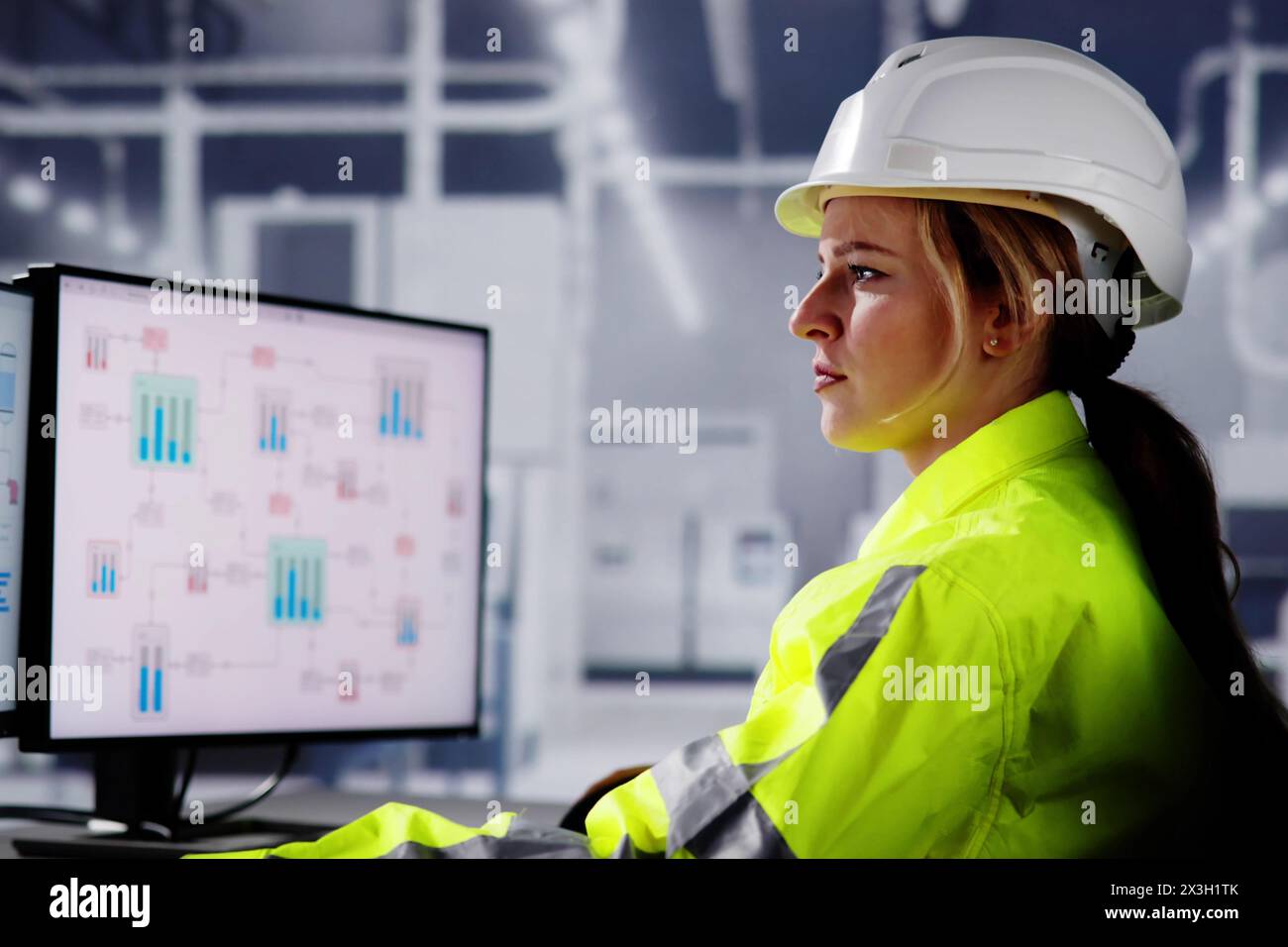 Woman engineer using computer software in system design concept. Stock Photo