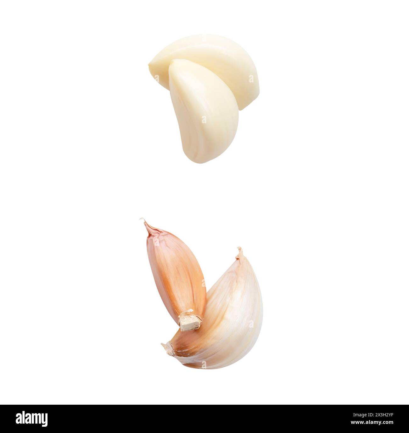 Top view set of peeled garlic cloves in stack is isolated on white ...