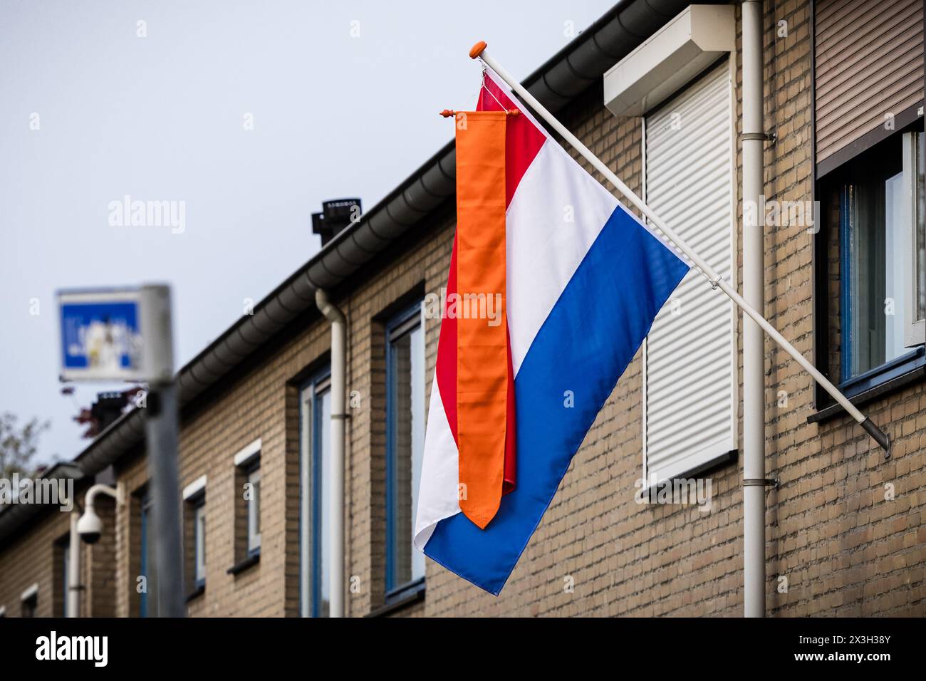 MIERLO - The Dutch flag with an orange pennant is flying for King's Day. While the royal family visits Emmen, the national holiday is also being fully celebrated in the rest of the country. ANP ROB ENGELAAR netherlands out - belgium out Stock Photo