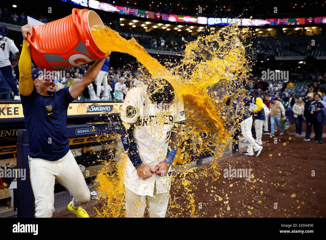 Milwaukee, WI, USA. 26th Apr, 2024. Milwaukee Brewers third base Joey Ortiz (3) has gatorade dumped on him in celebration by shortstop Willy Adames (27) after the game between the Milwaukee Brewers and the New York Yankees at American Family Field in Milwaukee, WI. Darren Lee/CSM/Alamy Live News Stock Photo