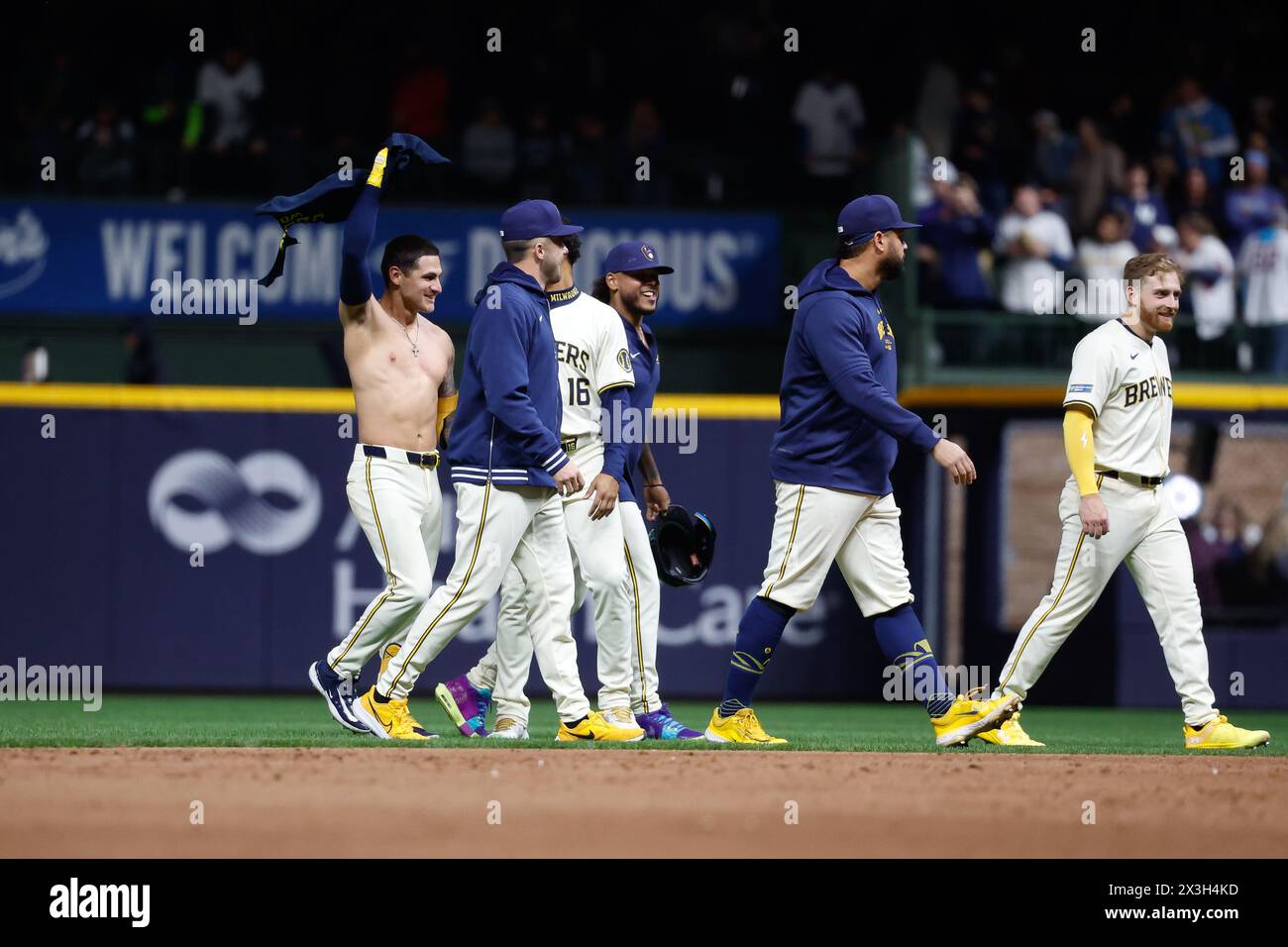 Milwaukee, WI, USA. 26th Apr, 2024. Milwaukee Brewers third base Joey Ortiz (3) twirls his ripped shirt after teammates tore his jersey and shirt off after his walk-off hit RBI after the game between the Milwaukee Brewers and the New York Yankees at American Family Field in Milwaukee, WI. Darren Lee/CSM (Credit Image: © Darren Lee/Cal Sport Media). Credit: csm/Alamy Live News Stock Photo