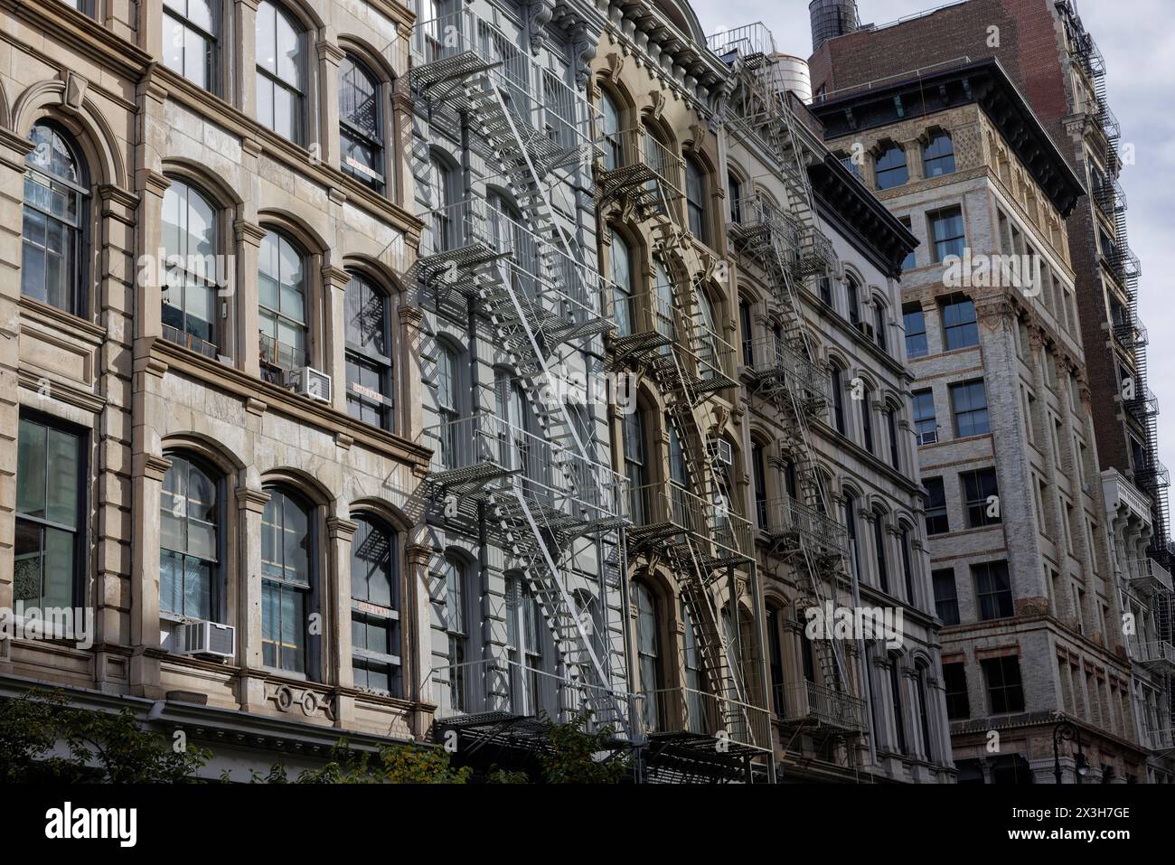 Historic 19th century facades in Cast Iron Historic District, Broome Street, SoHo, Lower Manhattan, New York City Stock Photo