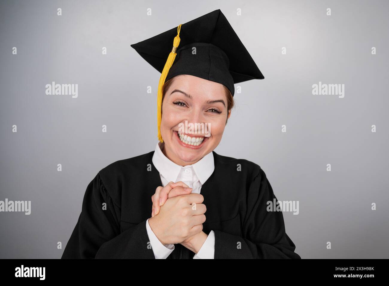 Emotional graduate in academic gown hi-res stock photography and images ...