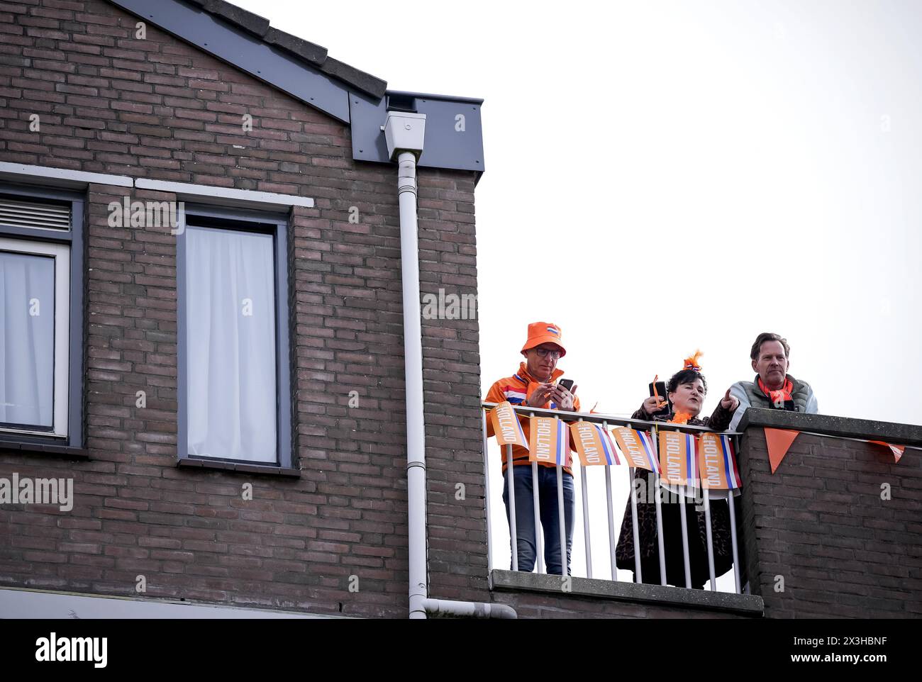 EMMEN - The first Orange fans have taken a place along the route that the royal family takes through the center of Emmen. ANP FREEK VAN DEN BERGH netherlands out - belgium out Stock Photo