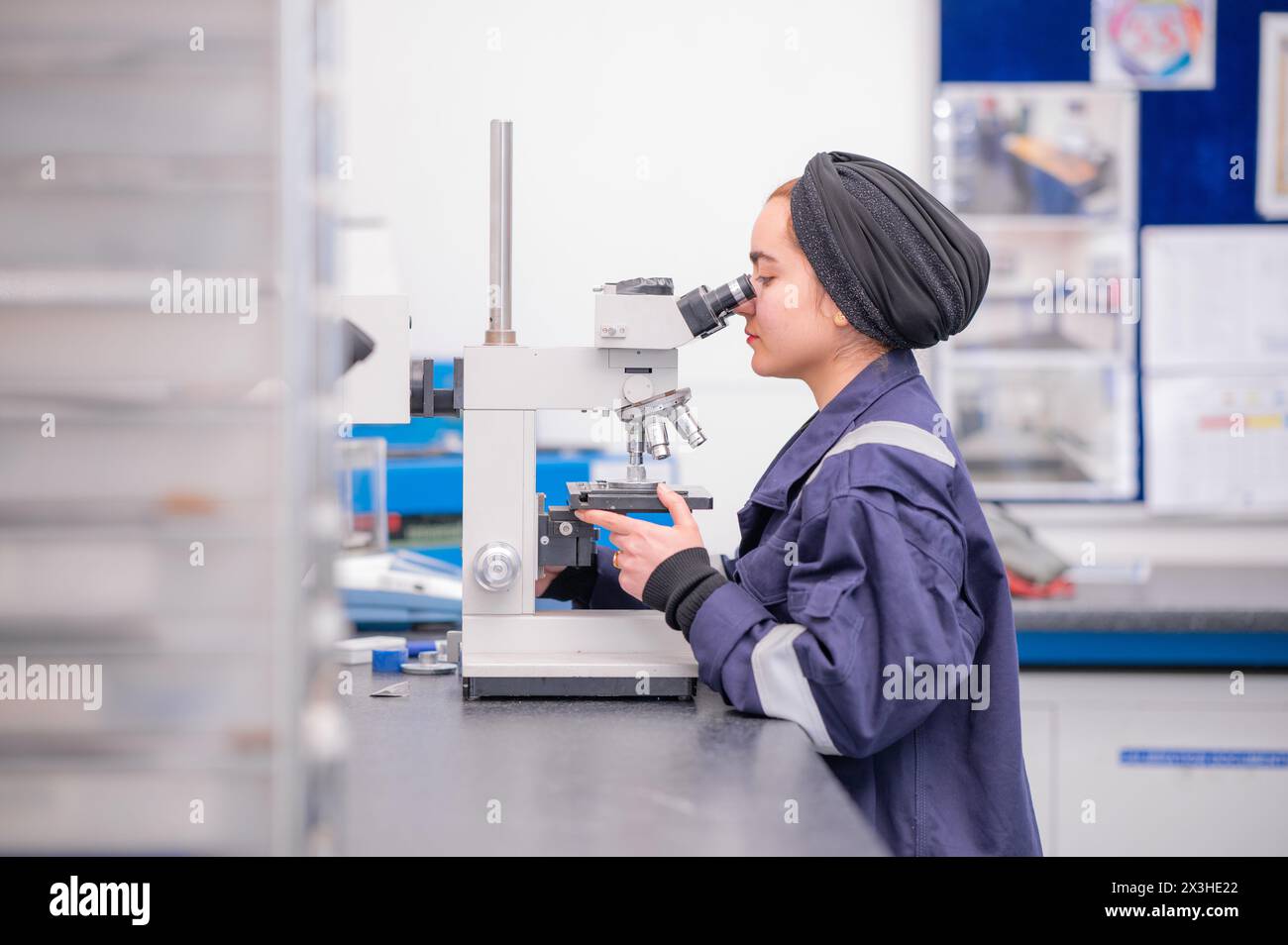 A female worker at a metal specialist. UK Stock Photo