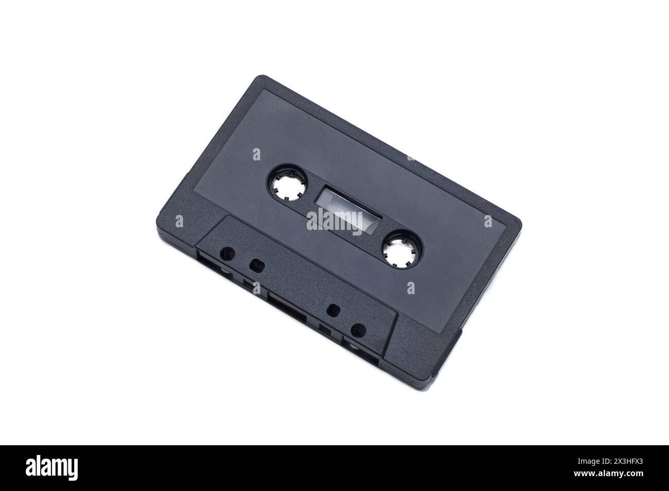 close up of vintage audio tape cassette blank black color and empty to add your own words and design. isolated on white background with clipping path Stock Photo