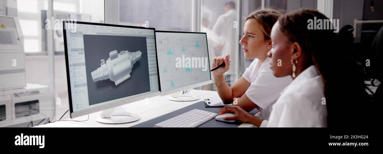 African American engineer using 3D computer to develop engineering skills Stock Photo