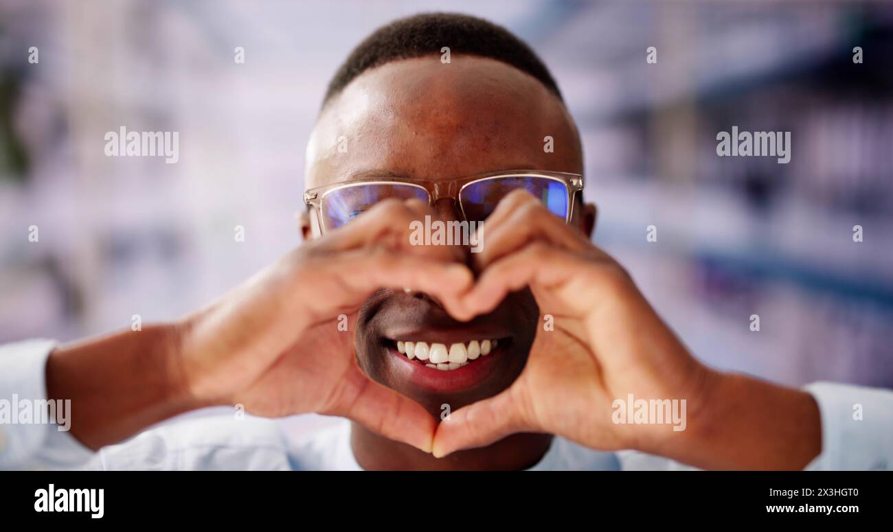 Man Making Heart Sign. Senior Hands Romantic Love Stock Photo
