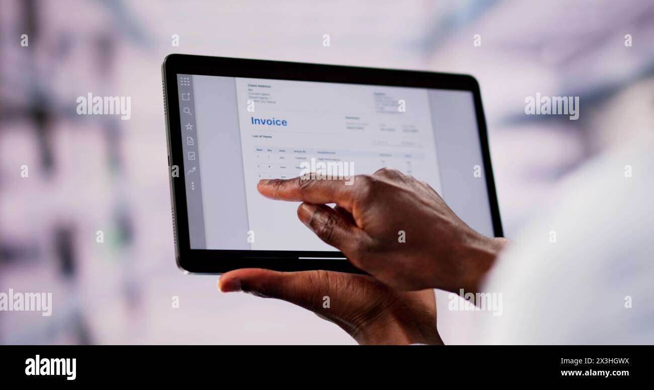 Accountant Checking Online Invoice On Tablet Screen Stock Photo