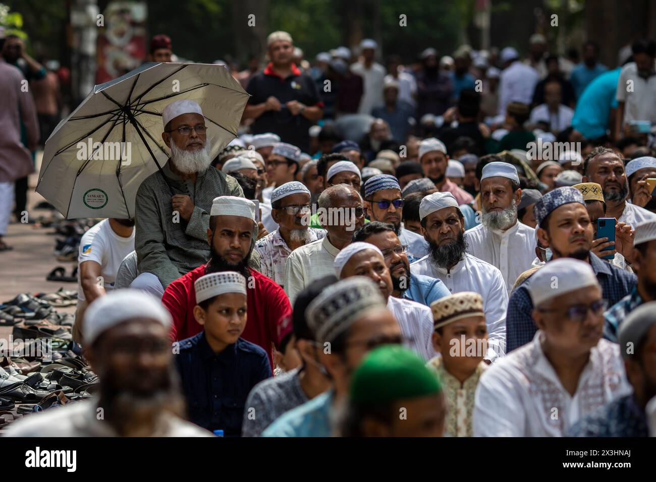 Dhaka, Bangladesh. 27th Apr, 2024. Muslims attend special prayers for rains in Bangladesh's capital Dhaka. In a heartfelt display of faith and unity, people gathered at the Masjid premises of Dhanmondi to participate in Istishka prayers (Special prayers), begging the mercy of the Almighty Allah for rains and respite from the sweltering temperatures. Credit: SOPA Images Limited/Alamy Live News Stock Photo