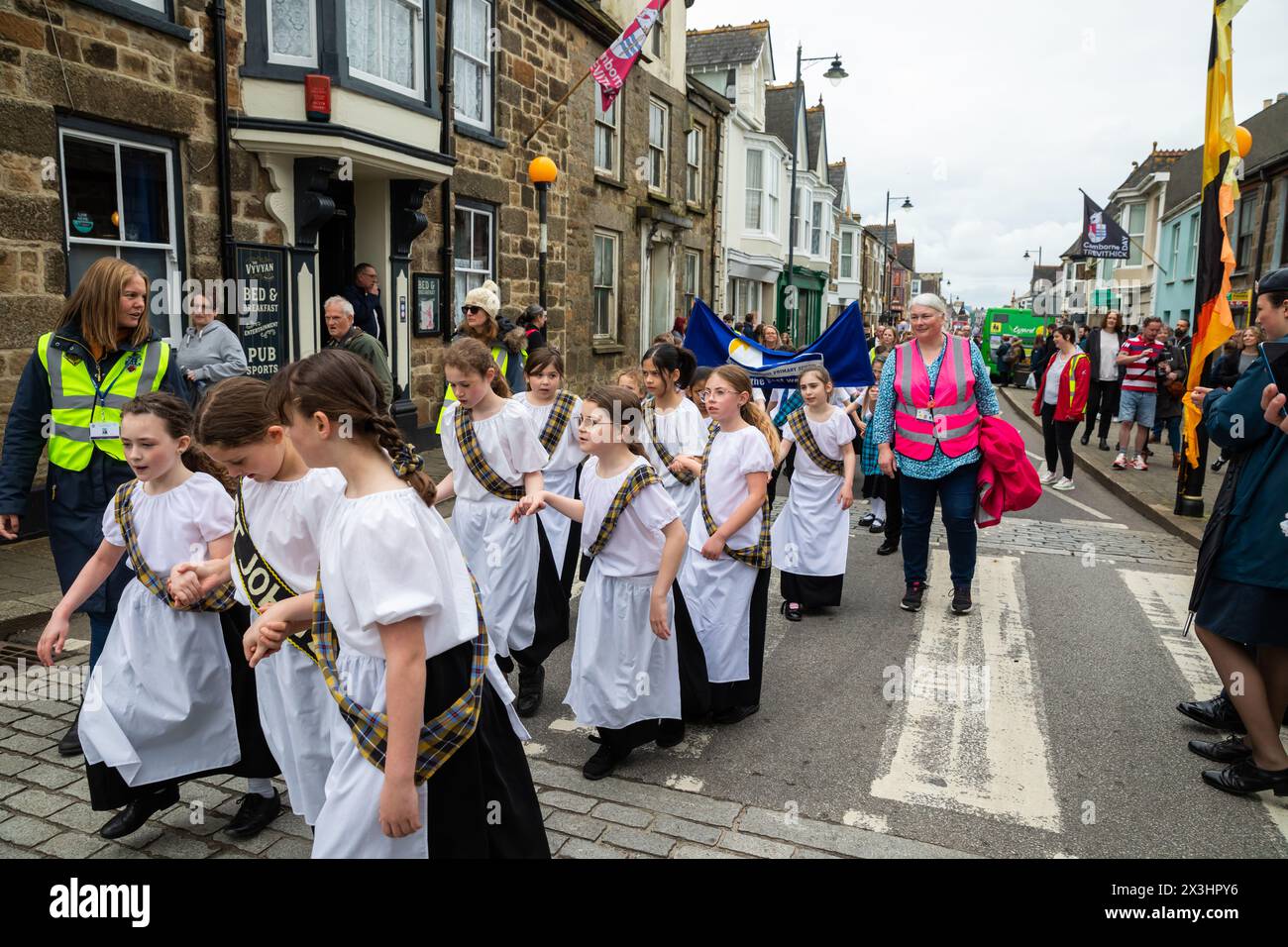 Camborne, Cornwall, UK, 27th April 2024, Richard Trevithick (13 April 1771 - 22 April 1833) was a British inventor and mining engineer who was celebrated in the annual parade today. The event which drew about 25-35,000 people started early morning with Kernow Pipes and Drummers procession followed by a Bal Maiden and Miners Children's Dance. In the afternoon there was an adults Trevithick dance followed by the main event of the day which was a large parade of Steam Traction Engines. There were local bands and choirs, Street entertainers etc.Credit:Keith Larby/Alamy Live News Stock Photo