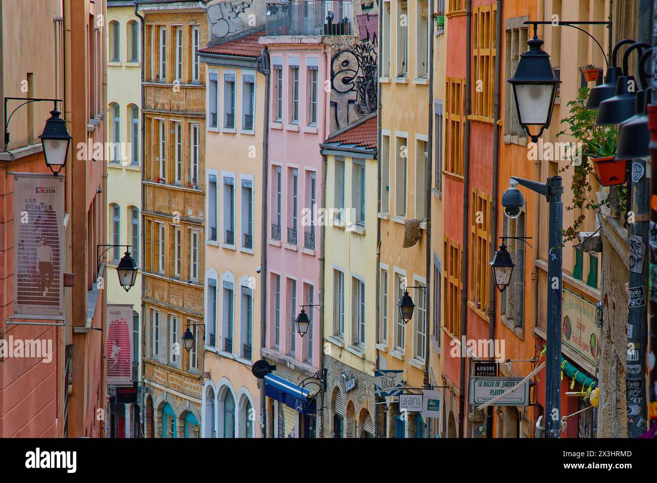 LYON, FRANCE, March 2, 2024 : Old colored houses on the slopes of La Croix-Rousse hill in city center of Lyon Stock Photo
