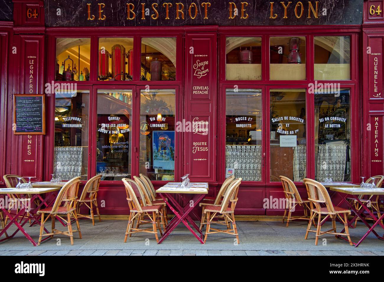 LYON, FRANCE, April 6, 2024 : The 'bouchons' are traditional restaurants of Lyon cuisine. Lyon takes 1st place in ranking of «15-minute cities», a con Stock Photo