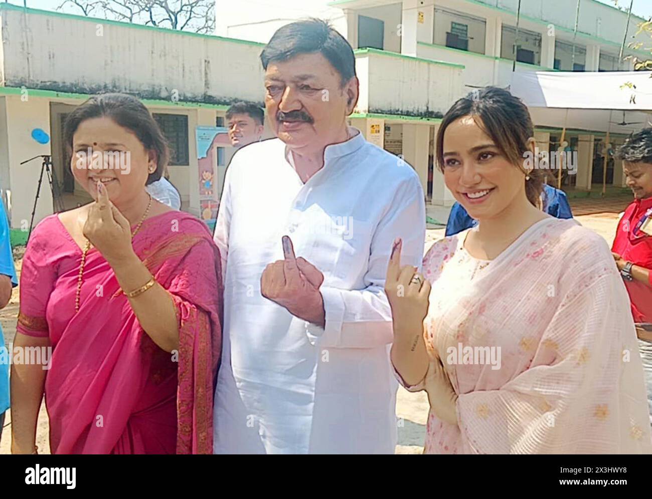 Bhagalpur, India. 26th Apr, 2024. BHAGALPUR, INDIA - APRIL 26: Congress candidate Ajit Sharma with his daughter actor Neha Sharma showing finger ink after casting their votes during second phase of Lok Sabha election on April 26, 2024 in Bhagalpur, India. (Photo by Santosh Kumar/Hindustan Times/Sipa USA) Credit: Sipa USA/Alamy Live News Stock Photo