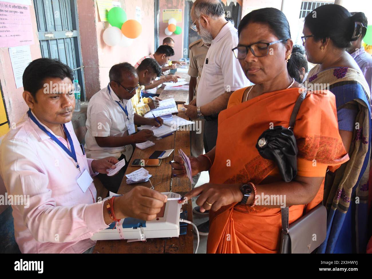 BHAGALPUR, INDIA - APRIL 26: Voters casting their votes during second phase of Lok Sabha election at a polling booth   on April 26, 2024 in Bhagalpur, India.  (Photo by Santosh Kumar/Hindustan Times/Sipa USA) Stock Photo