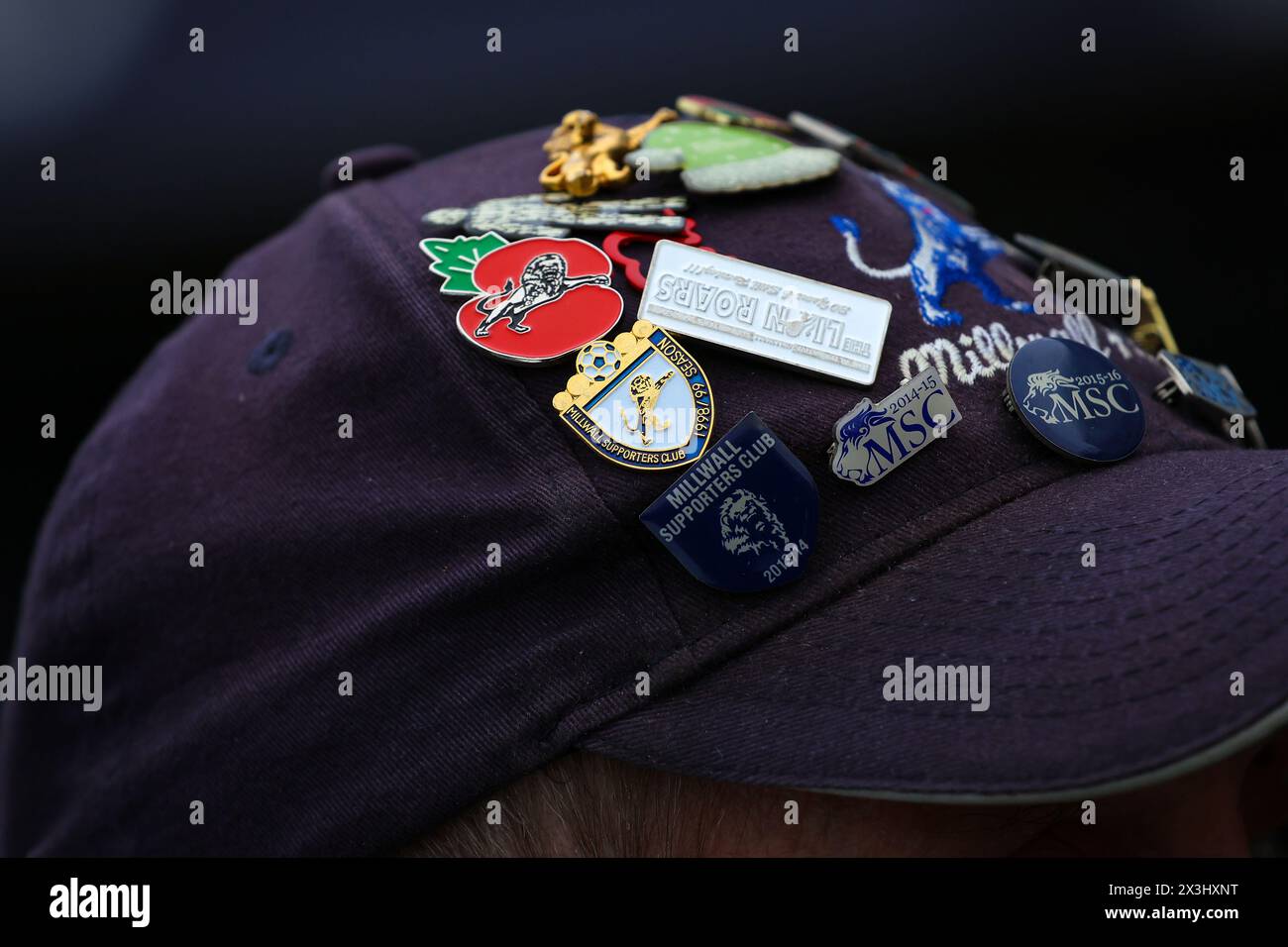 The Den, Bermondsey, London, UK. 27th Apr, 2024. EFL Championship Football, Millwall versus Plymouth Argyle; Millwall fan wearing a Millwall Supporters Club pin badge on his hat outside The Den Stadium Credit: Action Plus Sports/Alamy Live News Stock Photo