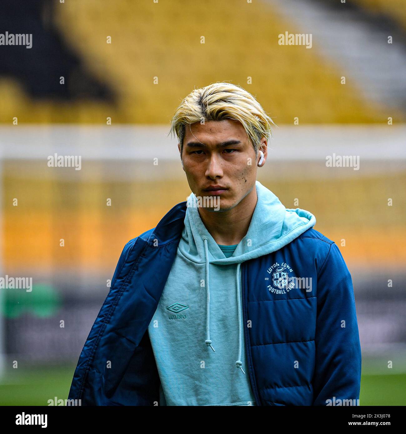 27th April 2024; Molineux Stadium, Wolverhampton,  West Midlands, England; Premier League Football, Wolverhampton Wanderers versus Luton Town; Daiki Hashioka of Luton Town inspects the pitch before kick-off Credit: Action Plus Sports Images/Alamy Live News Stock Photo