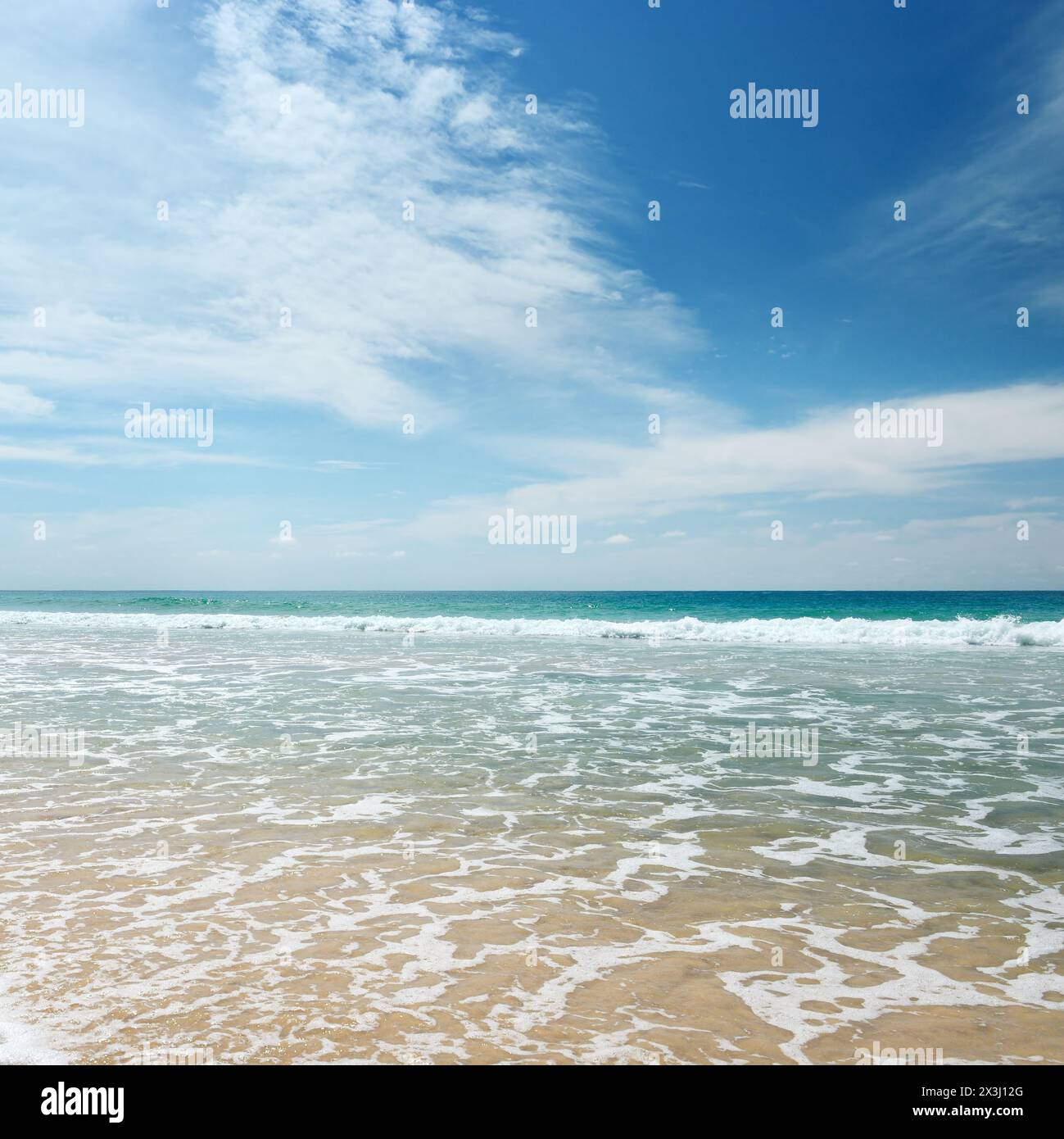 Ocean waves and blue sky Stock Photo
