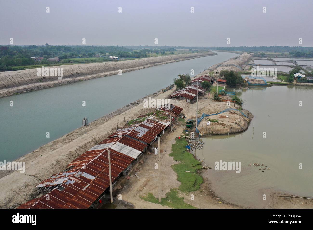 Khulna, Bangladesh - April 11, 2024: The Water Development Board has restored the normal flow of the river by dredging the Kapotaksha River at Paikgac Stock Photo