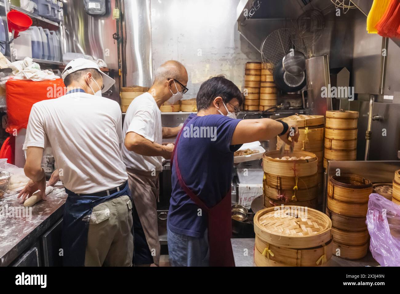 Asia, Singapore, Chinatown, Typical Food Court, Hawker Stall Kitchen Making Chinese Dim Sum Steamed Food Stock Photo