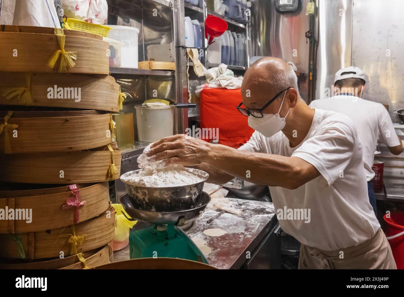 Asia, Singapore, Chinatown, Typical Food Court, Hawker Stall Kitchen Making Chinese Dim Sum Steamed Food Stock Photo