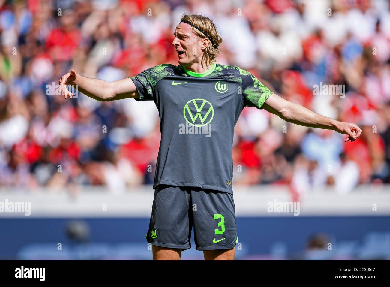 Freiburg Im Breisgau, Germany. 27th Apr, 2024. Soccer: Bundesliga, SC Freiburg - VfL Wolfsburg, Matchday 31, Europa-Park Stadium. Wolfsburg's Sebastiaan Bornauw reacts during the match. Credit: Tom Weller/dpa - IMPORTANT NOTE: In accordance with the regulations of the DFL German Football League and the DFB German Football Association, it is prohibited to utilize or have utilized photographs taken in the stadium and/or of the match in the form of sequential images and/or video-like photo series./dpa/Alamy Live News Stock Photo